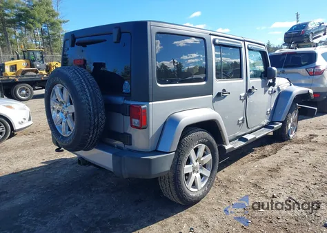 2015 Jeep Wrangler Unlimited Sahara z USA, uszkodzony, nr VIN 1C4BJWEG6FL544055